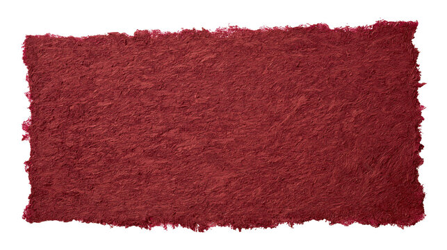 Isolated textured deep dark red handmade paper rectangle with irregular torn rough edges