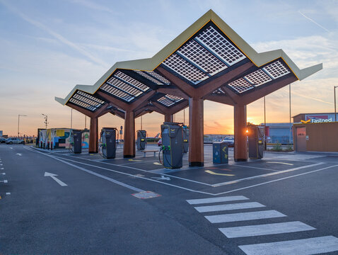 Fastned Solar-Powered Electric Vehicle Superhub Canopy at Sunset