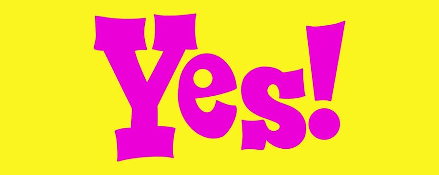 Animated pink Yes typography with exclamation mark breaking apart and fragmenting into shattered pieces on bright yellow background looping video asset