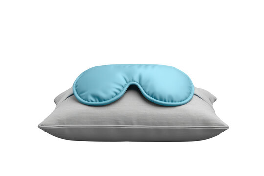 Light blue satin sleep mask resting on gray pillow