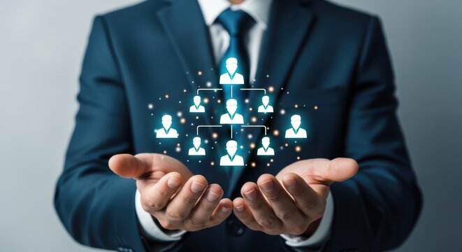 businessman holding glowing corporate organizational chart in open hands, concept of company hierarchy and team management