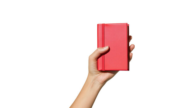 Isolated hand holding a vibrant red journal or small personal notebook for writing