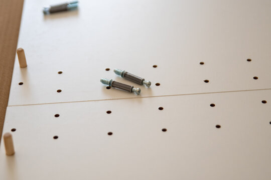 the joy of building your own furniture with screws and dowels and holes in wooden boards.