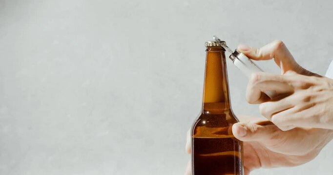 Close-Up of a Human Hand Opening a Bottle Cap by Hand, Demonstrating Simple Everyday Action and Practical Product Usage