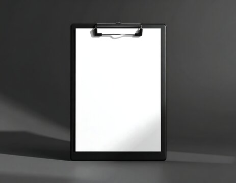 A clean minimalist black clipboard with a blank white paper sheet against a dark grey background. Ideal for corporate branding and design mockups.