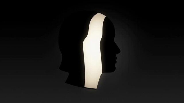 Human head silhouette in side profile against dark background with soft backlight