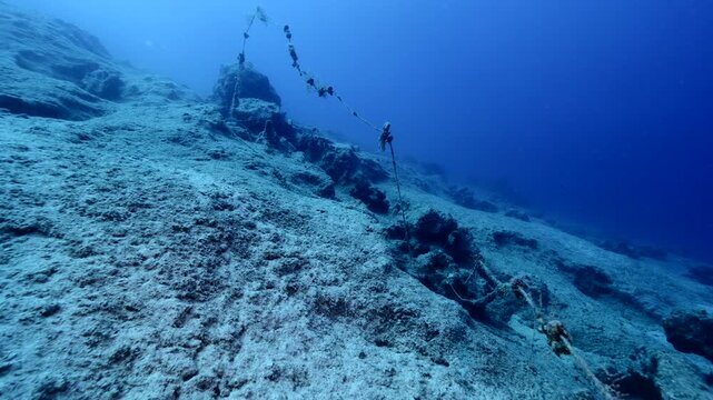 old fish net underwater ghost hunting 4k pollution of oceans driftnets