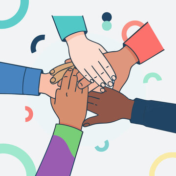 Group hands stacked in unity with colorful sleeves and geometric shapes
