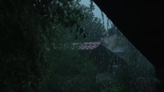 Monsoon season. Summer storm, dark sky cloudy heavy rain, weather in rainy season.
