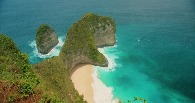 Famous Kelingking Beach peninsula shows iconic dinosaur shape in Bali Nusa Penida