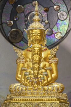 The Buddhas nestled within one another symbolise the inner journey, the continuity of the teachings and the infinite radiance of the Dharma, Main Chedi (Phra That), Wat Phra That Sorn Kaew Buddhist temple complex, Khao Kho Mountains, Phetchabun Province, Isan, Thailand