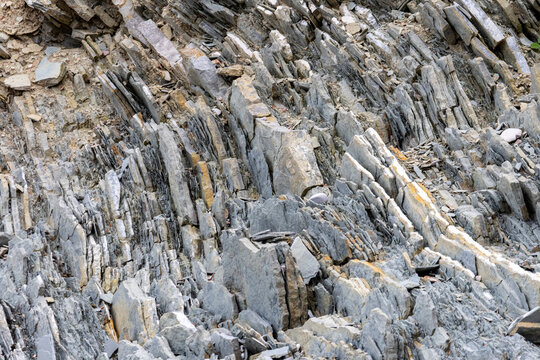Gaspesie, Quebec, 15 July 2026 : Close-up view of a natural rock formation displaying fractured and layered geological strata.