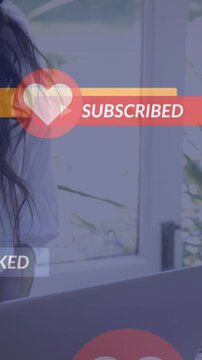 Animation of heart, thumbs up icons, notification bars with text, woman working on laptop