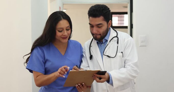 latin man doctor and hispanic woman nurse working in a mexican hospital in Mexico latin america