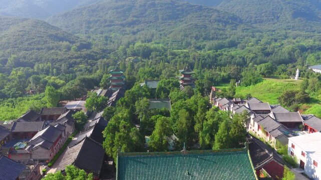 Aerial view of Shaolin Temple in morning mist, world cultural heritage in Henan China, birthplace of Zen Buddhism and Shaolin Kung Fu。Chinese civilization，Chinese philosophy