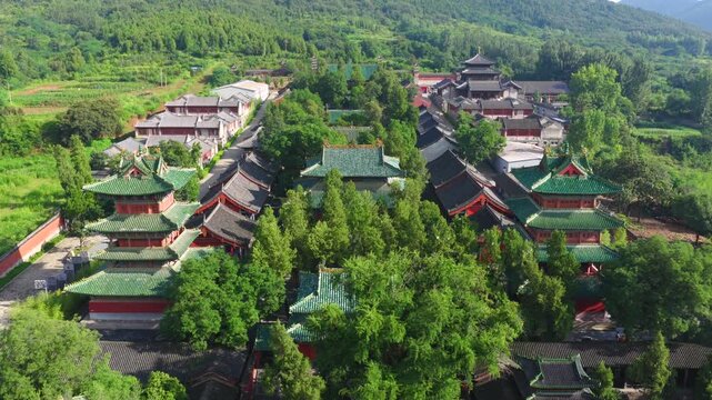 Aerial view of Shaolin Temple in morning mist, world cultural heritage in Henan China, birthplace of Zen Buddhism and Shaolin Kung Fu。Chinese civilization，Chinese philosophy
