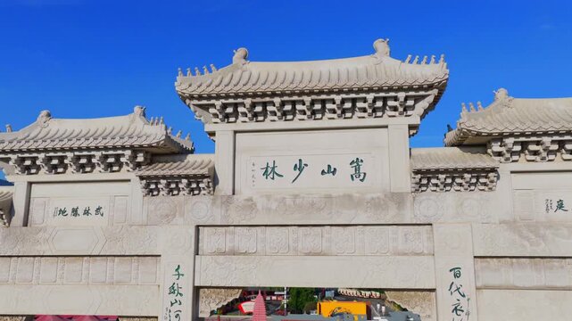 ncient buildings of Shaolin Monastery with flying pigeons at sunrise, sacred landmark of Chinese martial arts culture。Chinese civilization，Chinese philosophy