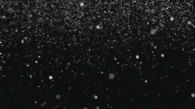 Falling white glowing particles and snow animation background video footage