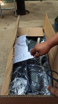 Unboxing Executive Office Chair Parts from Cardboard Delivery Box
