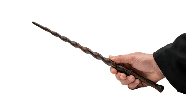 A hand holding a dark brown wooden magic wand with a twisted spiral texture and tapered point isolated on a transparent background