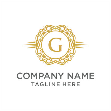 A sophisticated monogram logo featuring an ornate frame and a stylized letter G. This design is suitable for branding and luxury businesses.