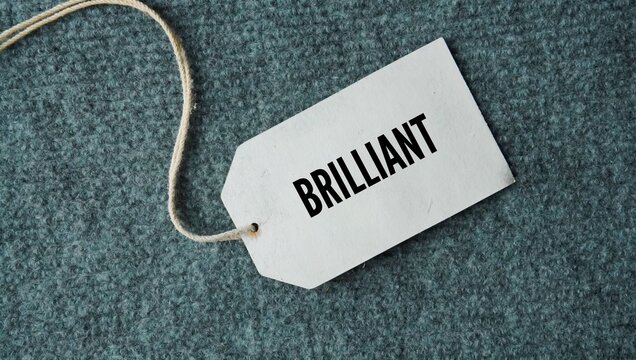 Tag the paper with the word Brilliant. shining very brightly, showing great intelligence, or being wonderfully excellent.