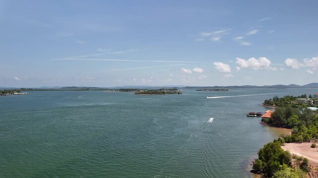 Aerial Panorama: Boats Navigate Calm Waters near Batam Islands, Indonesia - 4K