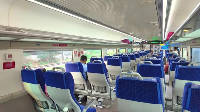 Modern Vande Bharat Train Coach Interior With Passengers During Rail Journey in India