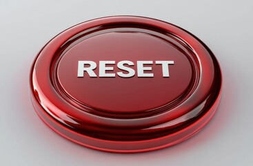 Fototapeta premium Glossy red circular reset button with white letters on a clean neutral surface conveying urgency and a fresh-start action