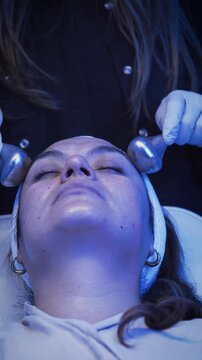Professional cryotherapy ice globe facial massage treatment