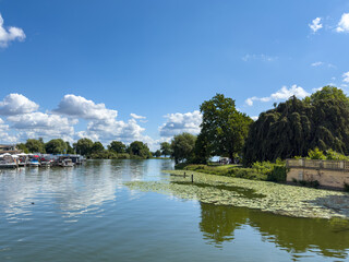 Fototapeta premium Lake Schwerin at Schlossinsel with boats and waterside landscape, Germany