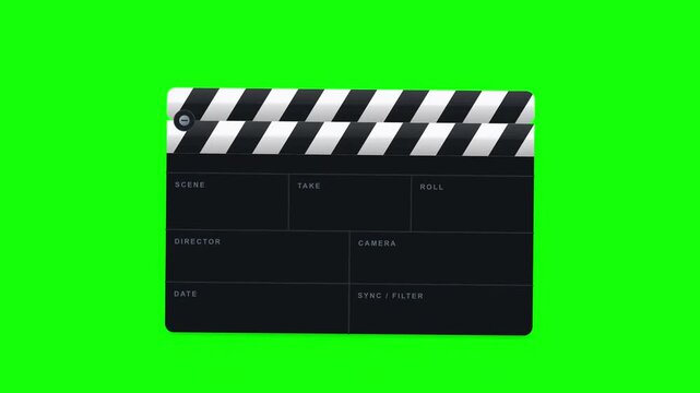 A professional film clapperboard tool for movie production and video editing scenes isolated on a green screen chroma key backdrop background