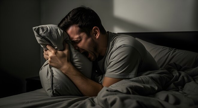 A vivid, atmospheric reinterpretation of man screaming into pillow in bedroom, raw emotional expression, moody shadows, relatable burnout concept, written with richer detail and modern clarity.
