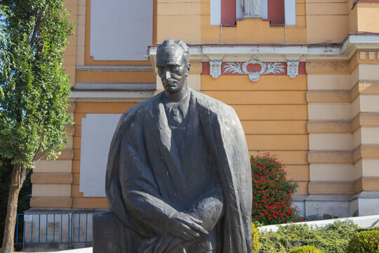 Statue of Romanian poet Lucian Blaga in front of the National Theatre in Cluj-Napoca, Romania - August 14, 2026