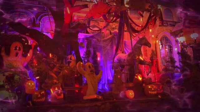 Spooky Halloween night decoration with dark red orange lights, rising smoke, and fireball effects