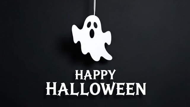 Hanging white paper ghost swinging gently above bold text on dark black background creative halloween motion video clip animation
