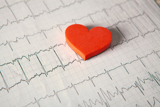 Heart on the cardiogram. Cardiogram and red heart