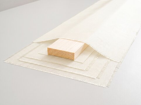Balsa core bedded into a dry glass spar cap layup before infusion