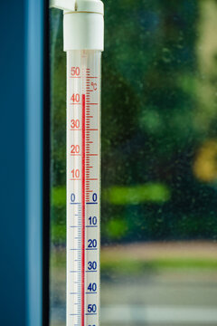 Thermometer shows high temperature during heat waves outside.