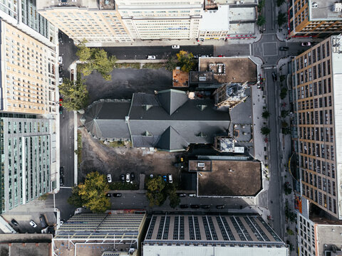 Drone flight in the downtown city skyline, foggy daytime view of Montreal, Quebec, Canada