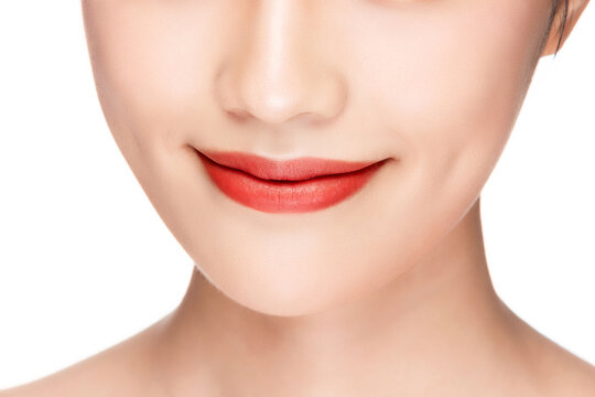 Close-Up of Smiling Woman's Lips and Smooth Lower Face