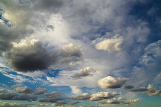 Dramatic Sky with Clearing Storm Clouds and Sunlight Patch