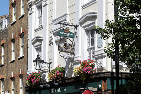 LONDON, UK - AUGUST 22, 2026:  Sign outside the Crown pun in Monmouth Street, Soho