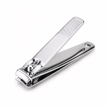 Metal clippers with textured grip against white.