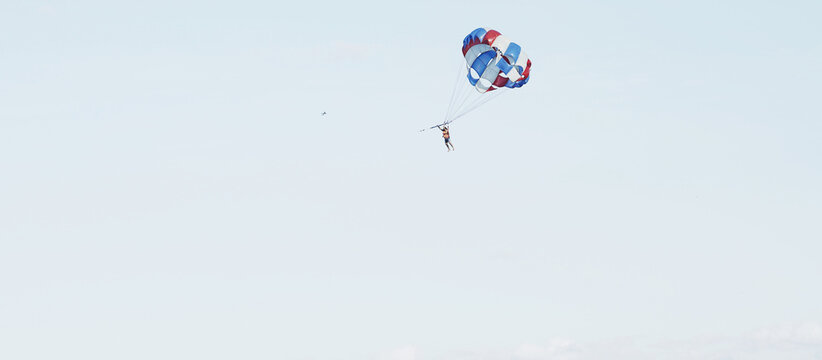 Parasailing over the sea. Da Nang coast. Active leisure.