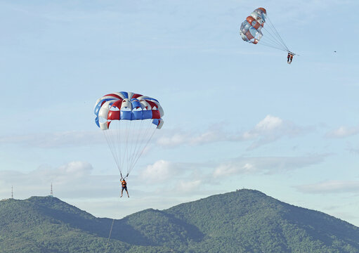 Parasailing over the sea. Da Nang coast. Active leisure.