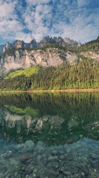 Gosausee lake with alpine mountain reflections in the Salzkammergut, Austria