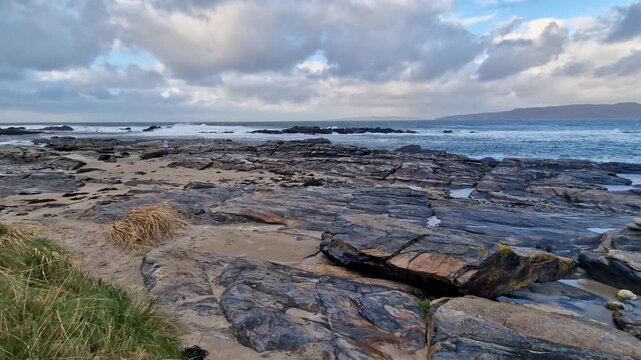 The rocks of Carrickfad by Portnoo at Narin Strand in County Donegal Ireland