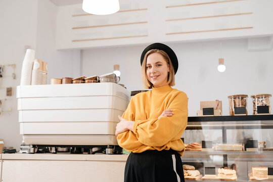 Female barista at her work place