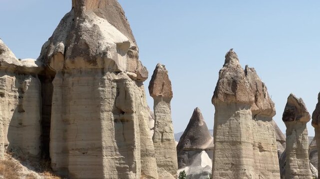 Close-up of fairy chimneys in Love Valley Cappadocia. Concept of geological heritage, natural wonder, travel destination and outdoor exploration. High quality 4k footage